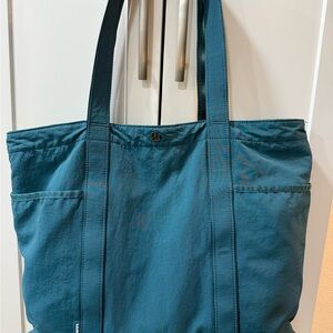lululemon athletica teal Tote Bag